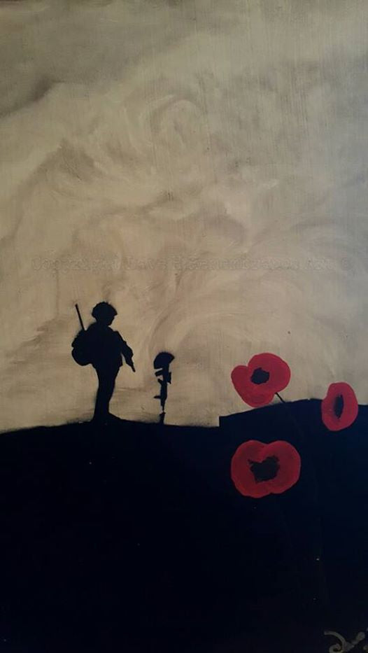 Dave H Remembrance Art painting, 'Never lonely' depicts a lone soldier stood at the battlefield cross of a fallen comrade with poppies in the foreground.
