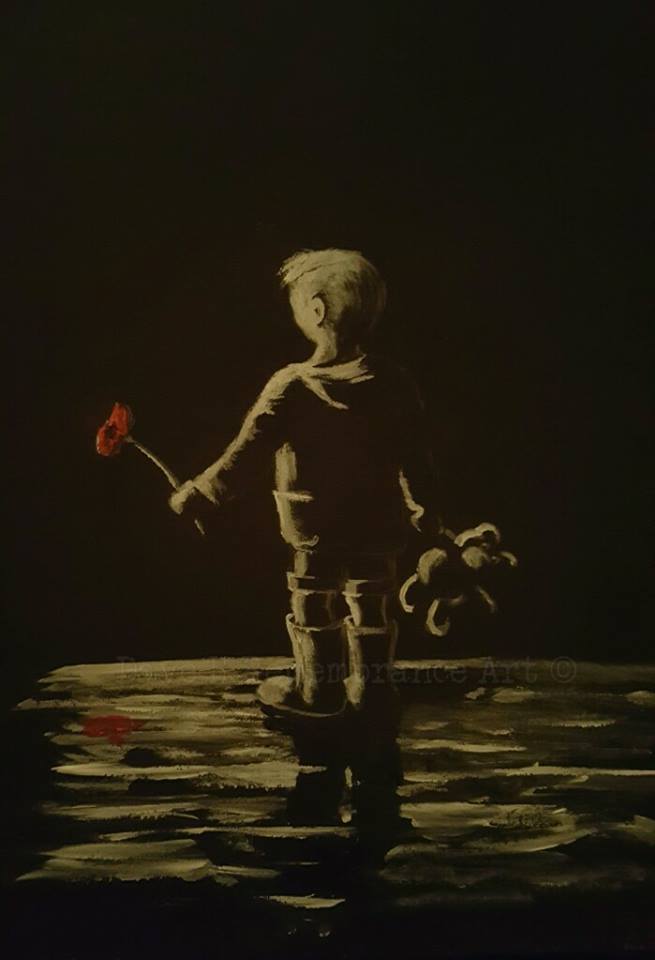 boy painting black and white poppy