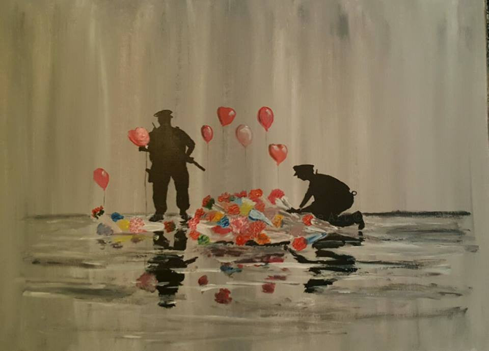 police laying flowers