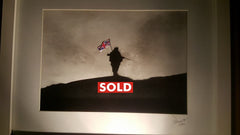 an original acrylic and enamel painting on board by up- -and-coming UK artist Dave H, who is fast becoming known for his remembrance themed artwork. Depicting the iconic figure of the 'yomper' with the Union Flag attached to his kit which became synonymous with the conflict.